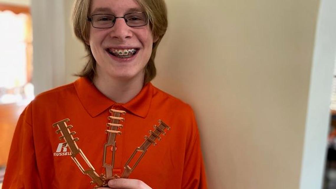 Rayen Early College Middle School eighth-grader Nick Pettitt used the small 3D printer he got for Christmas to construct bands that make surgical masks more comfortable. (Contributed photo)