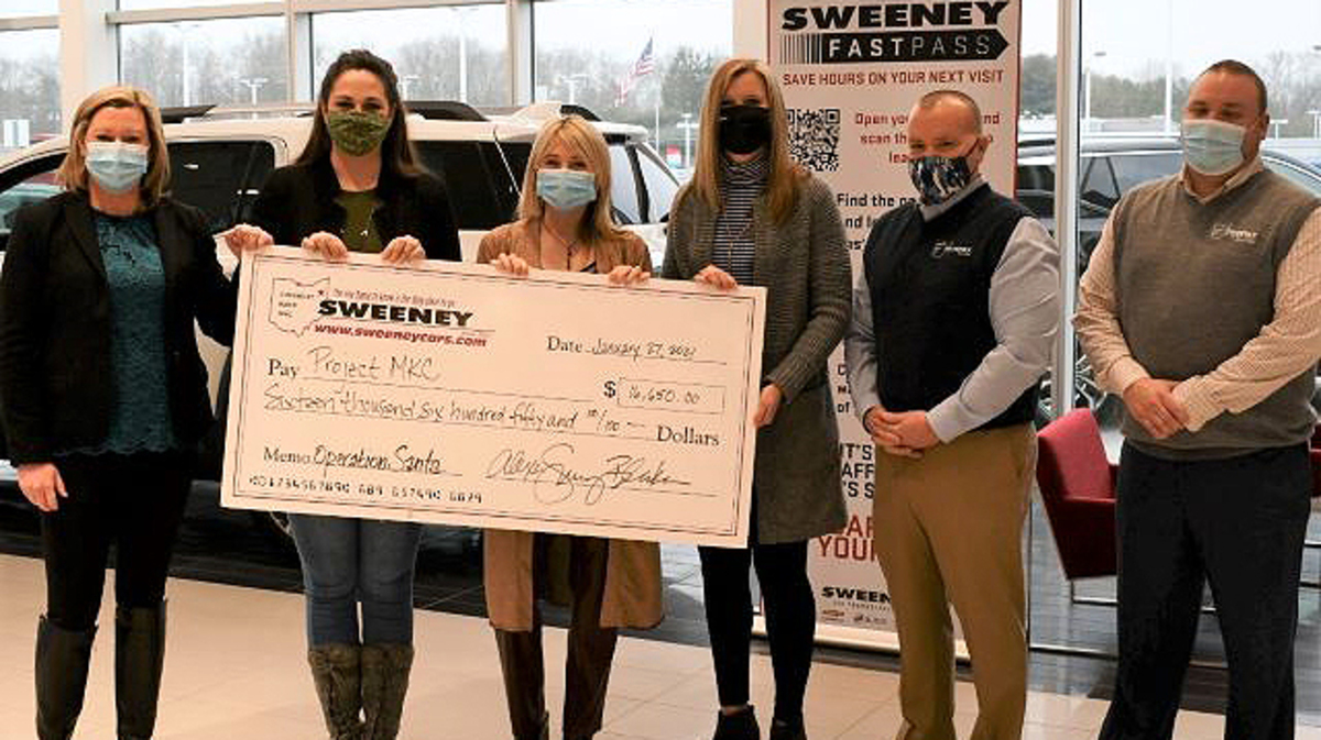 Sweeney Chevrolet Buick GMC representatives present a $16,650 check to Project MKC. From left, Alexa Sweeney Blackann, president of Sweeney Chevrolet Buick GMC; Colleen Gamble, Project MKC program director; Shelly Marlowe, Project MKC co-president; Jana Coffin, Project MKC co-president; Bobby Stackhouse, Sweeney Chevrolet executive manager; and Derek Snyder, Sweeney Buick GMC executive manager. (Contributed photo)