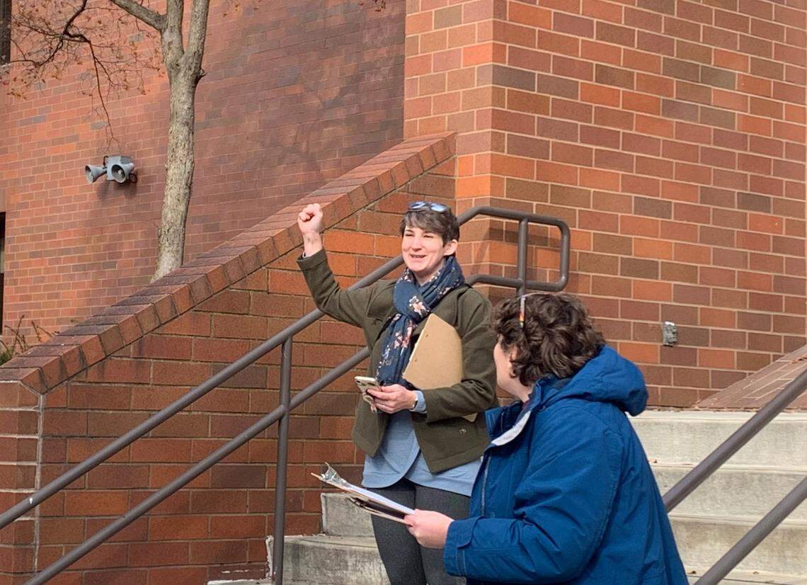 Sarah Lowry, two-time graduate of YSU and Amanda Fehlbaum, associate professor, at the rally outside Tod Hall.