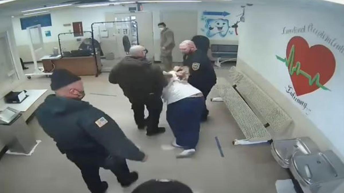 In this image made from video, prison guards escort Michael McDaniel, 55, to the medical facility at the Correctional Reception Center in Orient, Ohio. Ohio’s correctional agency has terminated seven employees after officials say prison guards used excessive and unjustified force against McDaniel before he died in custody in February. (Ohio Department of Rehabilitation and Correction via AP)