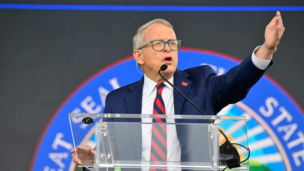 Gov. Mike DeWine speaks during a press conference Thursday in Avon Lake, Ohio, during Ford’s announcement that it will add 6,200 factory jobs in Michigan, Missouri and Ohio. The Ford factory in Avon Lake, near Cleveland, will be expanded so it can build an unidentified new electric commercial vehicle, with 1,800 new jobs.