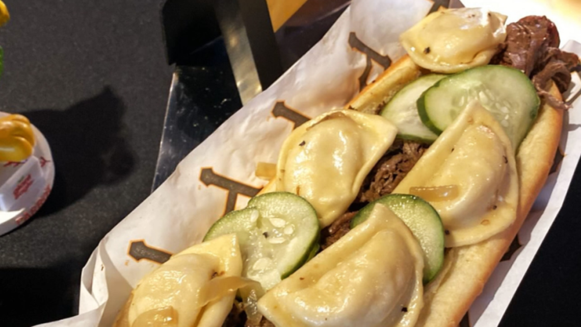 The Renegade Dog is a footlong hot dog, with pot roast, mini pierogies, pickle slices and onions.