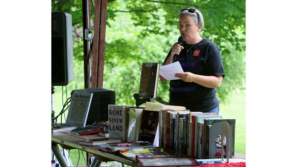 Youngstown City Schools teacher Heather Smith speaks during the “Teach the Truth” rally at Salem’s Waterworth Memorial Park on Saturday, June 11, 2022.