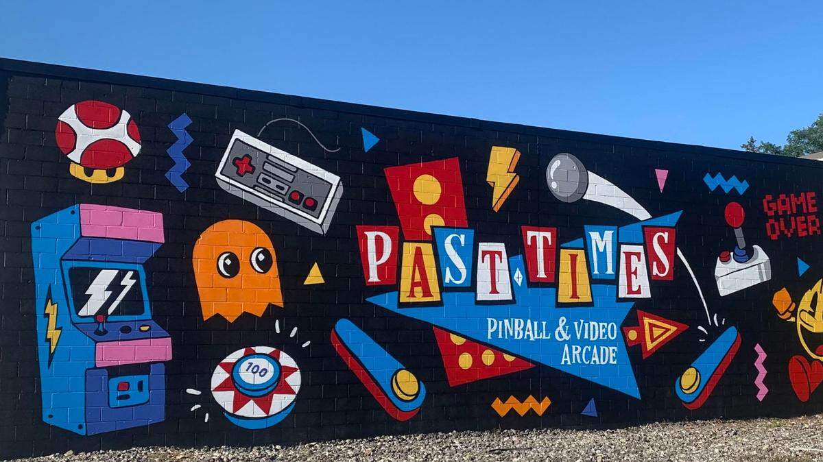 Past Times Arcade’s new mural was created by local artist and graphic designer Lydia Tarleton, a graduate of Howland High School as well as Youngstown State University. 