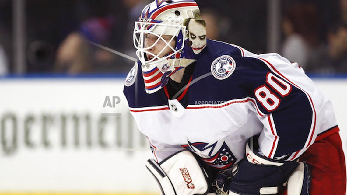 Columbus Blue Jackets goaltender Matiss Kivlenieks (80) is shown during the second period of an NHL hockey game in New York, in this Jan. 19, 2020 file photo. The Columbus Blue Jackets and Latvian Hockey Federation said Monday that the 
24-year-old goaltender has died from an apparent head injury in a fall.