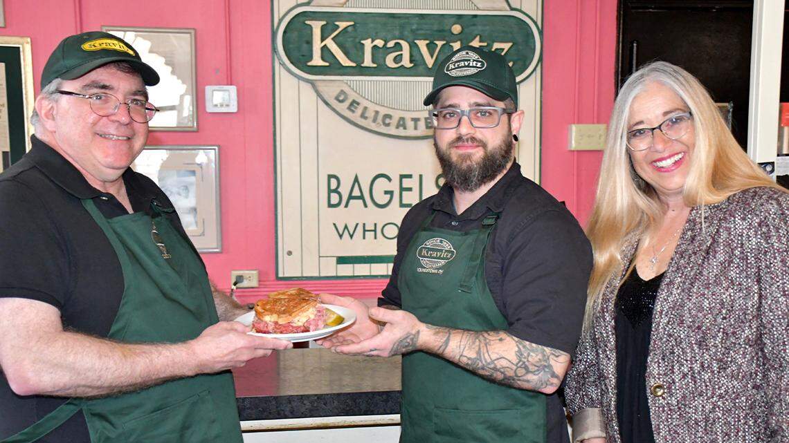 Jack Kravitz, left, owner of Kravitz Delicatessen Inc., has sold the business to Rydar Group LLC, owned by Matthew Rydarowicz of Hubbard, center. Patricia Rydarowicz, right, Mathew’s mother, has run Inspired Catering for the past decade and is the COO of Kravitz Deli.