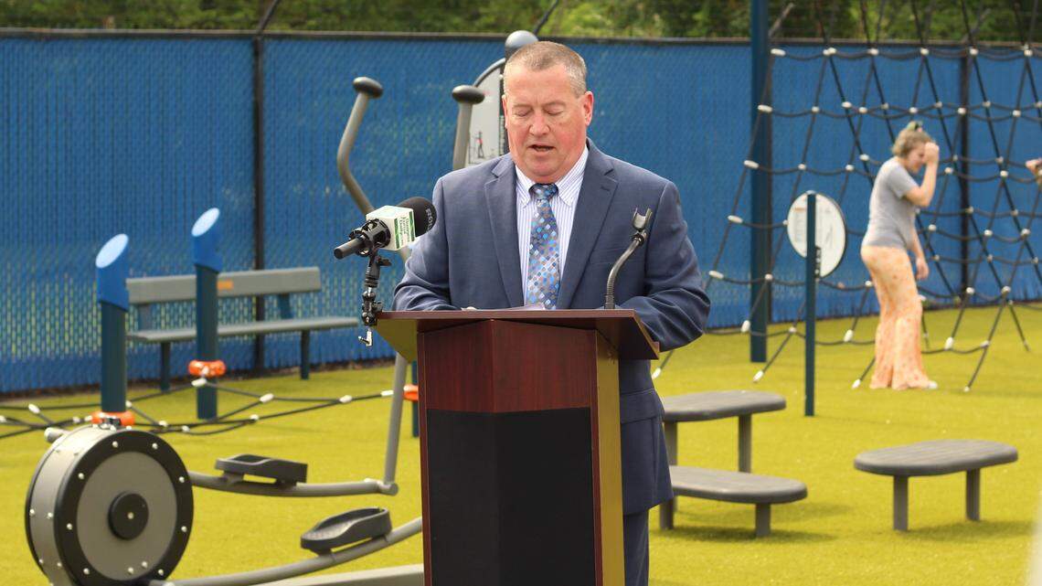 Potential Development CEO Paul Garchar welcomes those in attendance to dedicate the new $175,000 high school outdoor fitness center.