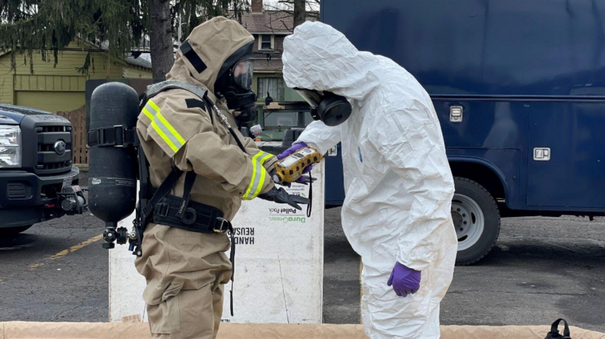 Members of the Ohio National Guard’s 52nd Civil Support Team prepare to enter an incident area to assess and monitor public facilities for any potential remaining hazards with a lightweight inflatable decontamination system (LIDS) in East Palestine, Ohio, Feb. 7, 2023.