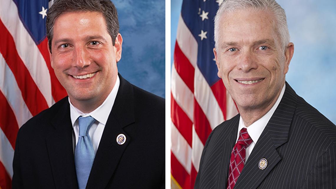 U.S. reps. Tim Ryan of Howland, D-13th, left, and Bill Johnson of Marietta, R-6th