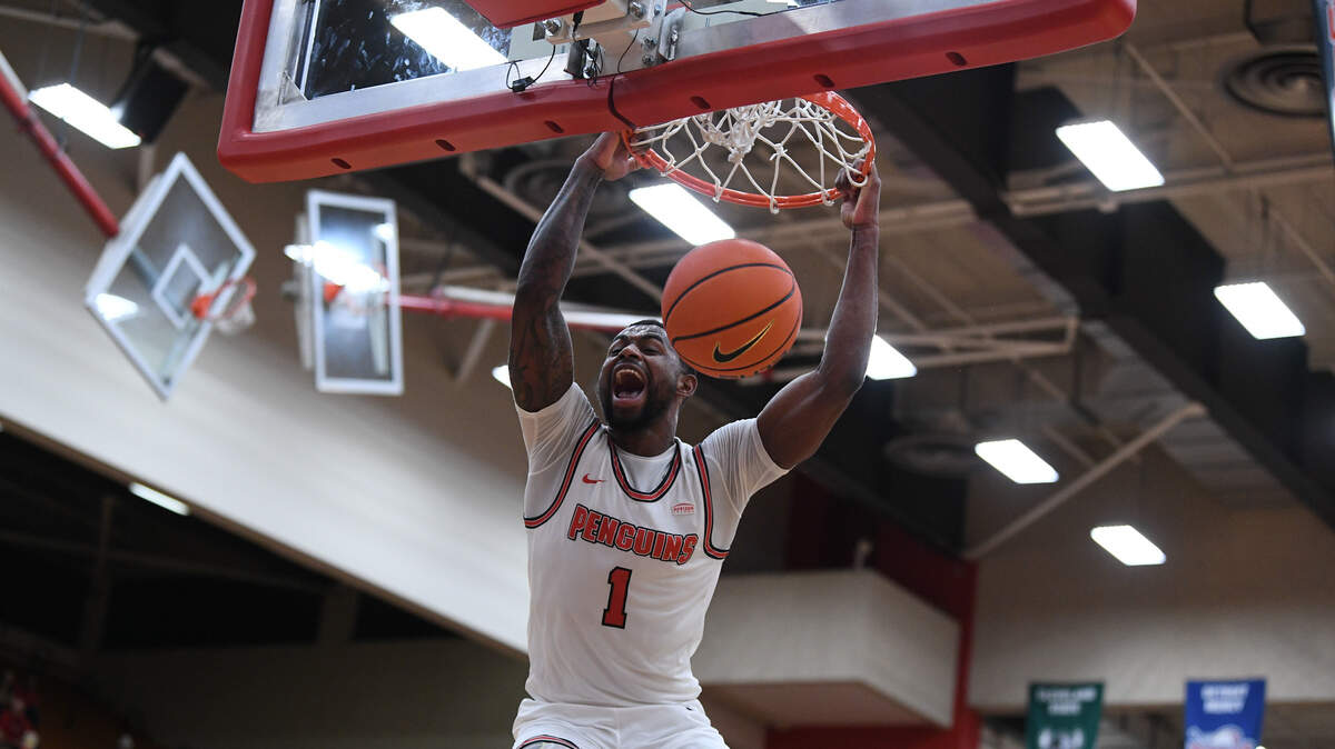Adrian Nelson dunks the ball during a game earlier this season against Wright State.