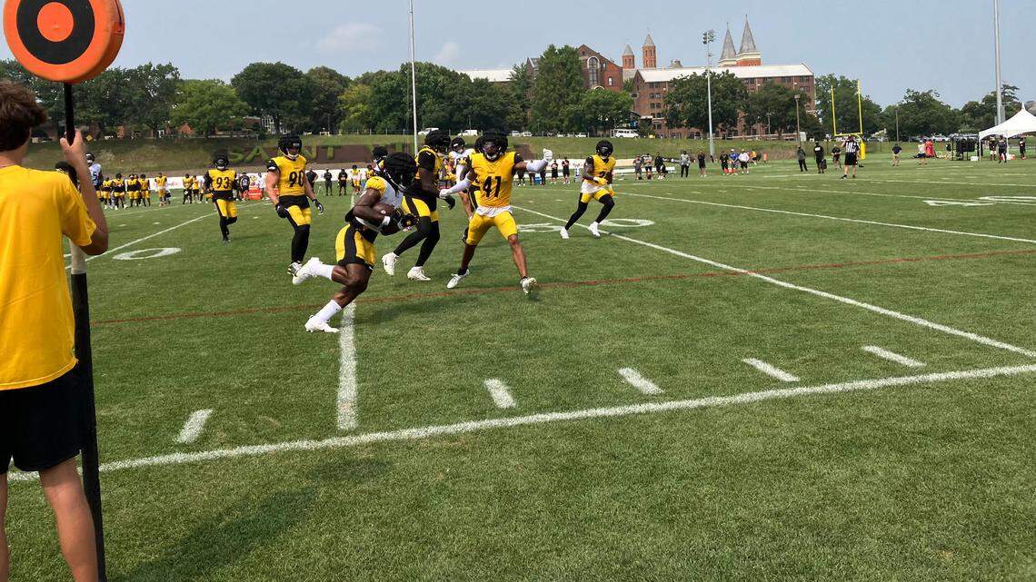 Najee Harris runs for daylight during Wednesday’s training camp practice.