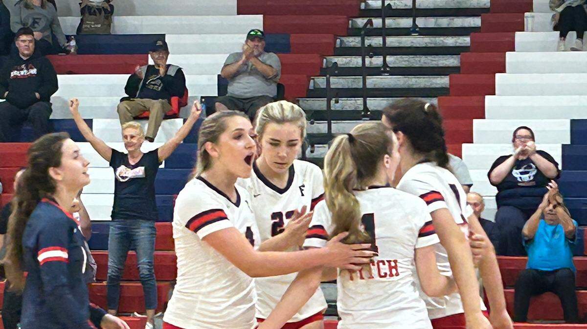 Austintown Fitch High School volleyball players celebrate Saturday’s win over Nordonia. From left are Izzy DiRenzo, Jordan Smith, Jocelyn Jourdan, Rylie Simons and Afton Roby.