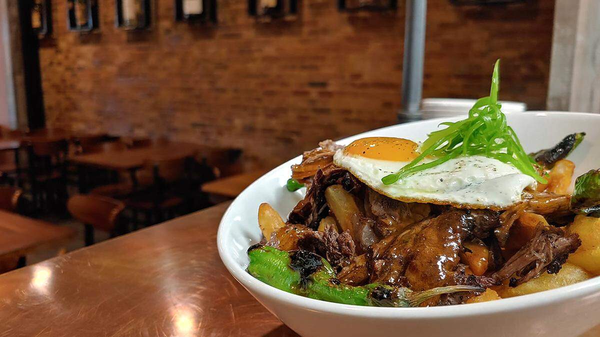Shown here is a bowl of Beauchene’s Poutine from West & Main restaurant in Warren, one of Mahoning Matters readers’ favorite comfort food dishes in the Mahoning Valley.