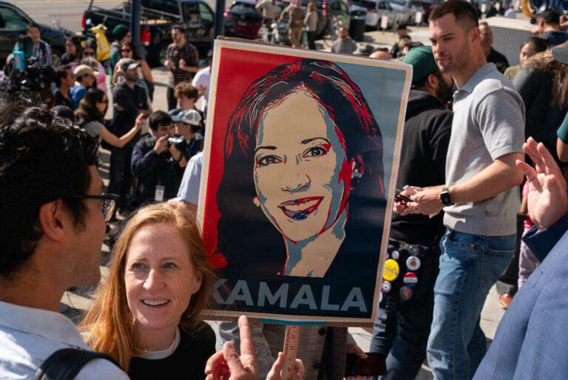 SAN FRANCISCO, CALIFORNIA - JULY 22: A supporter holds a sign as members of the San Francisco Democratic Party rally in support of Kamala Harris, following the announcement by US President Joe Biden that he is dropping out of the 2024 presidential race, on July 22, 2024 at City Hall in San Francisco, California. Biden has endorsed Harris to be the Democratic nominee. (Photo by Loren Elliott/Getty Images)