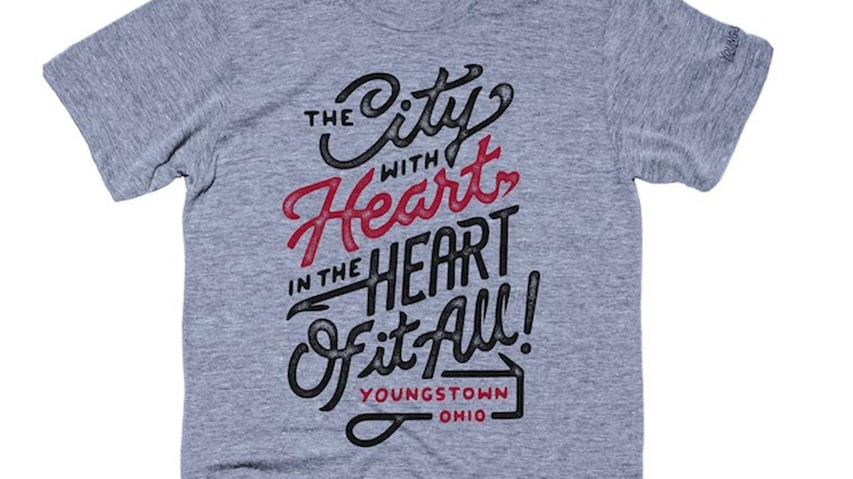 The phrase “The city with heart in the heart of it all! Youngstown Ohio” is printed on the grey
shirt in red and black font. Proceeds from this $20 shirt go to Second Harvest Food Bank of Mahoning County. (Photo provided)