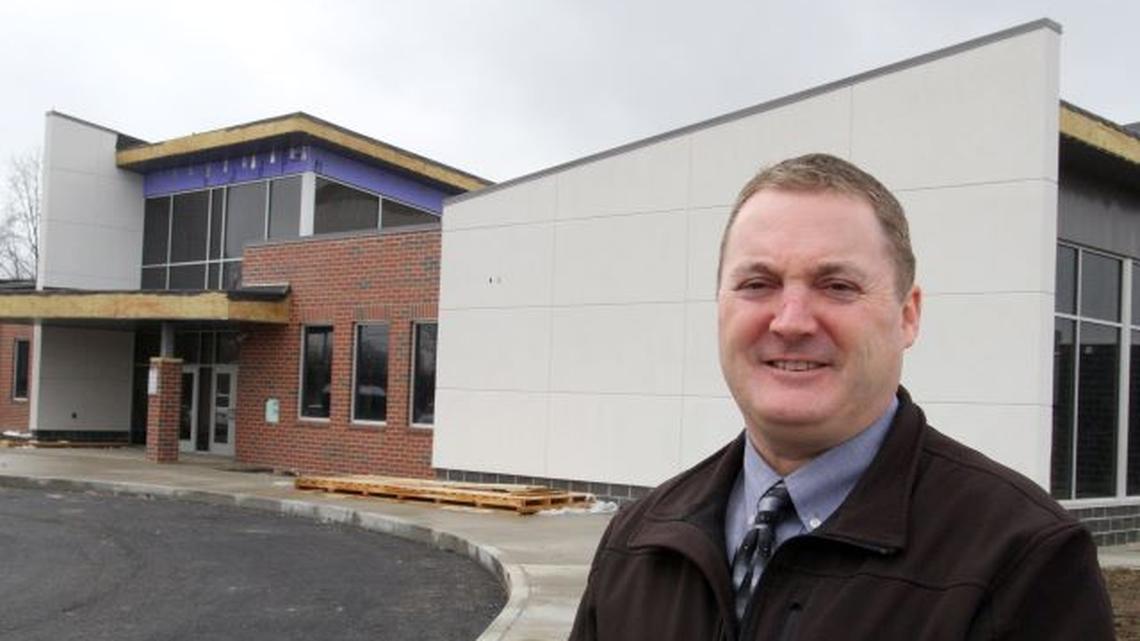 Campbell City Schools Superintendent Matthew Bowen stands outside the Community Literacy Workforce and Cultural Center in Campbell as work on the new facility was continuing in March. (Photo by William D. Lewis)