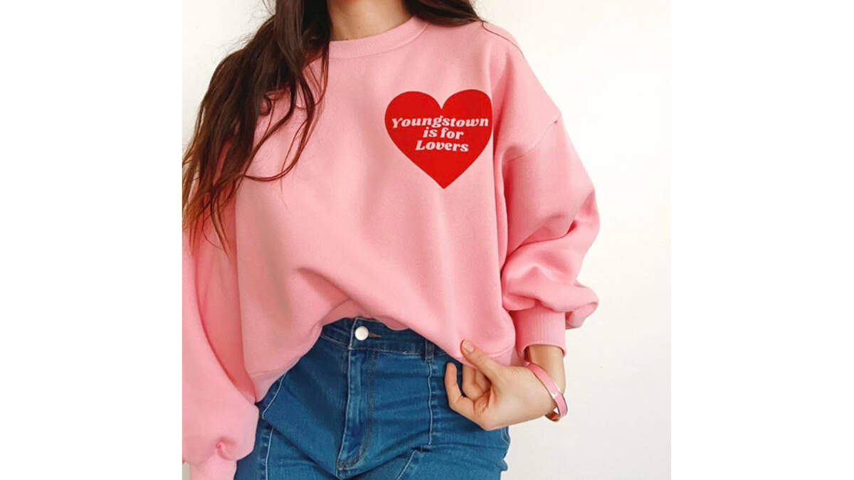 Shown here is a sweatshirt that reads “Youngstown is for Lovers,” a local Valentine’s Day gift idea from the locally owned Thirty-Four & Vine flower and fashion shop.