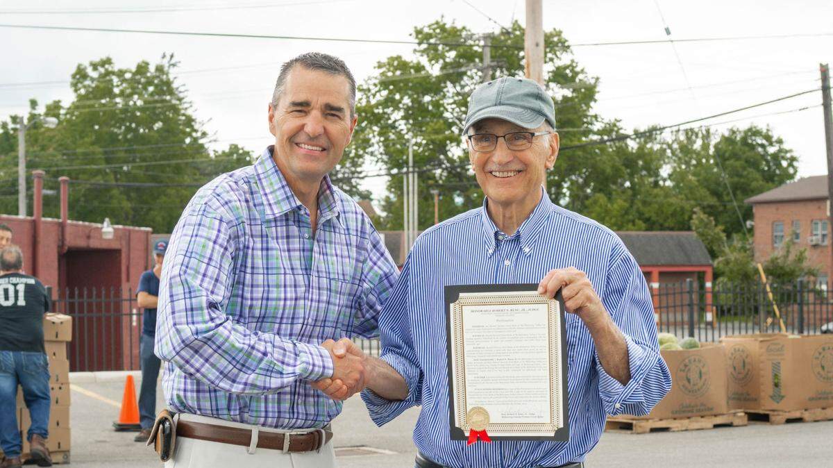 Mahoning County Probate Judge Robert Rusu, Jr. and Mike Iberis, director of Second Harvest Food Bank