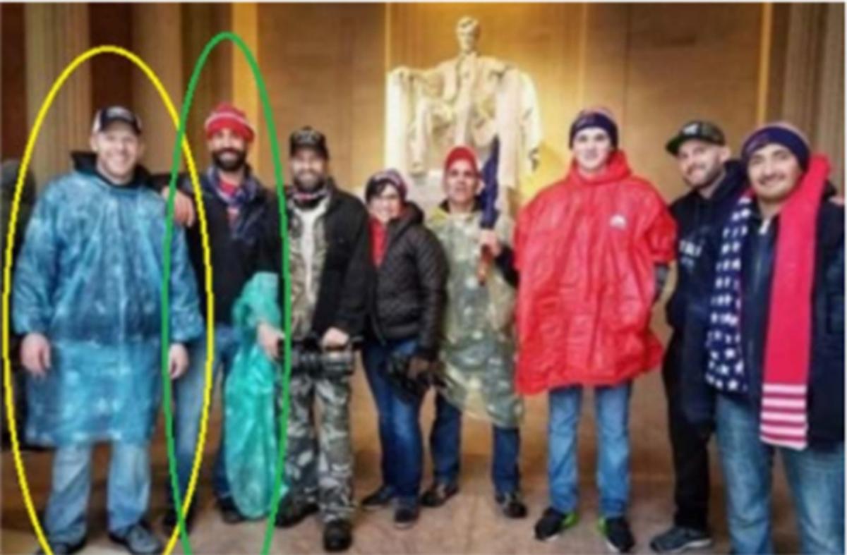 Stephen Ayres (circled in yellow) and Matthew Perna (circled in green) appear in this photo taken at the Lincoln Memorial on Jan. 5, 2021, the day before a deadly riot at the Capitol, and posted to social media.