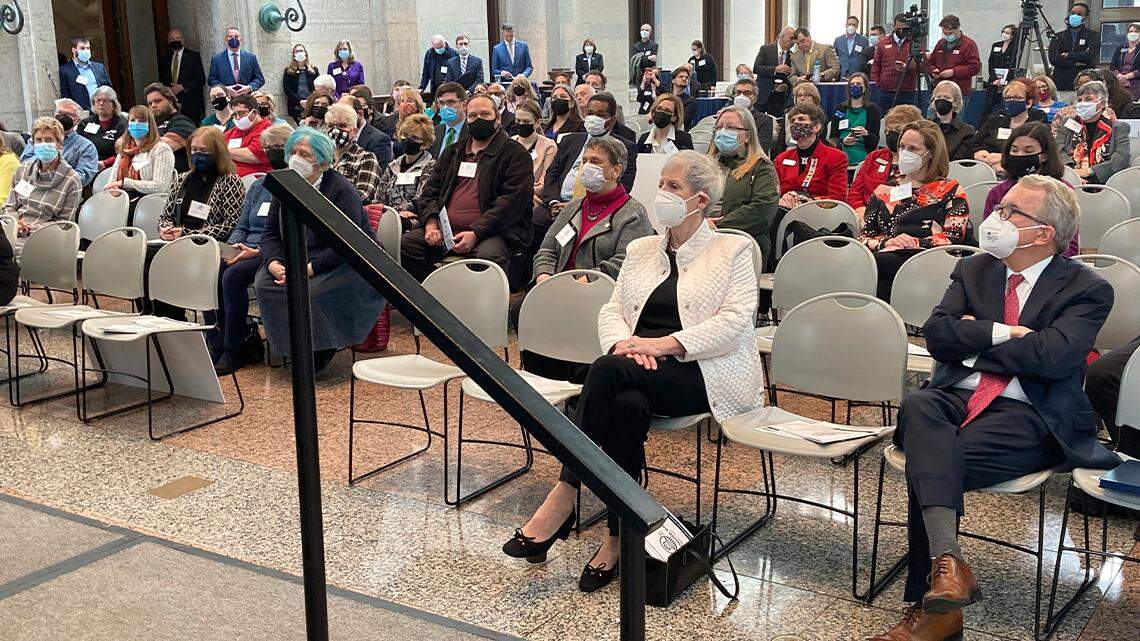 Ohio Supreme Court Chief Justice Maureen O’Connor, left, and Gov. Mike DeWine, both Republicans, listen to remarks by the new co-chairs of the commission leading Ohio’s commemoration of the United States’ 250th anniversary in 2026, at the Ohio Statehouse in Columbus on Tuesday. O’Connor has been the swing vote on recent court decisions striking down redistricting maps drawn by the Ohio Redistricting Commission, of which DeWine is a member.