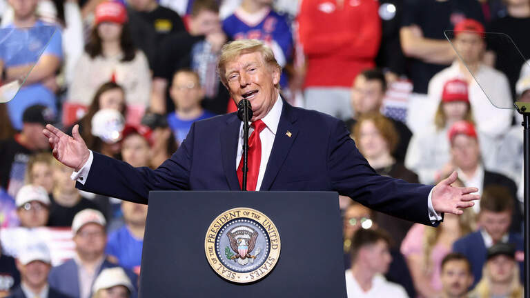 President Donald Trump pledges to keep downtown Youngstown warm at midterm rally