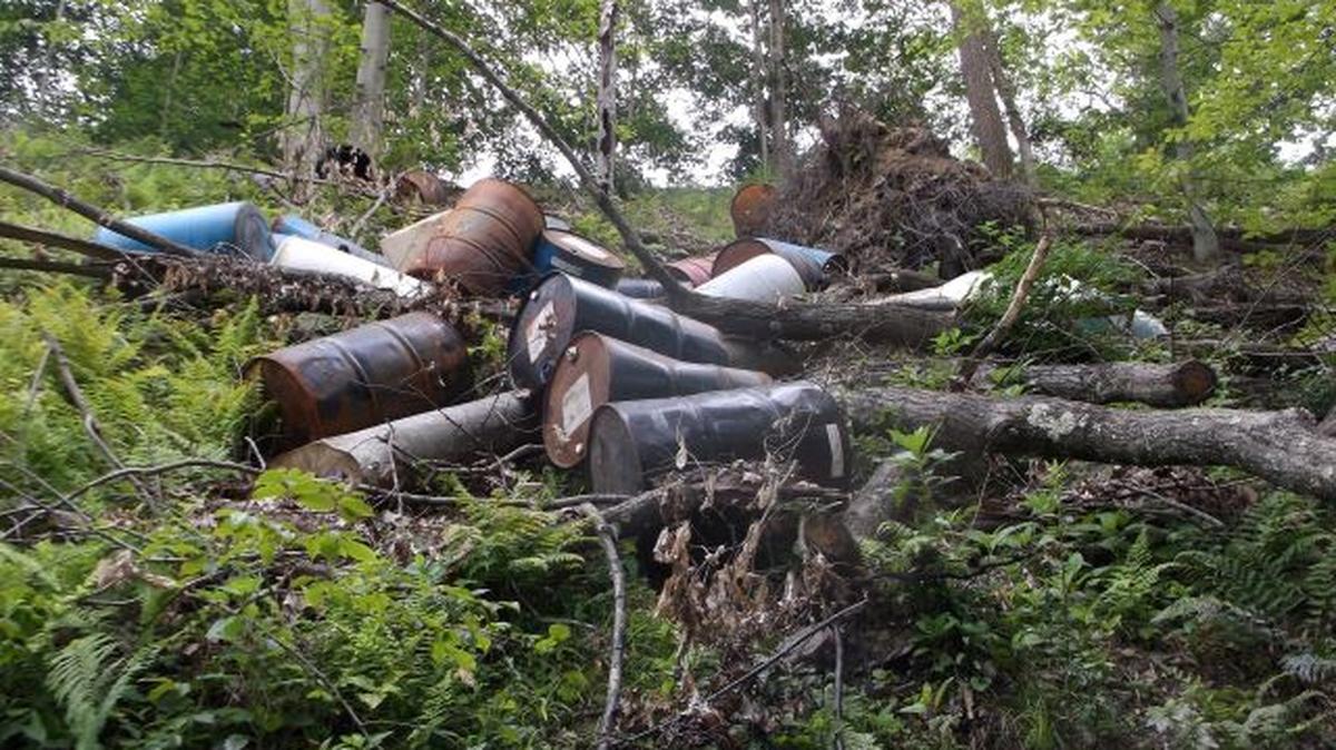 Christopher Joy pleaded guilty to complicity to illegal open dumping of solid wastes for helping another man, Timothy Patrick, dump 31 drums of waste down a ravine in July 2017. (Photo courtesy of https://twitter.com/OhioAG)
