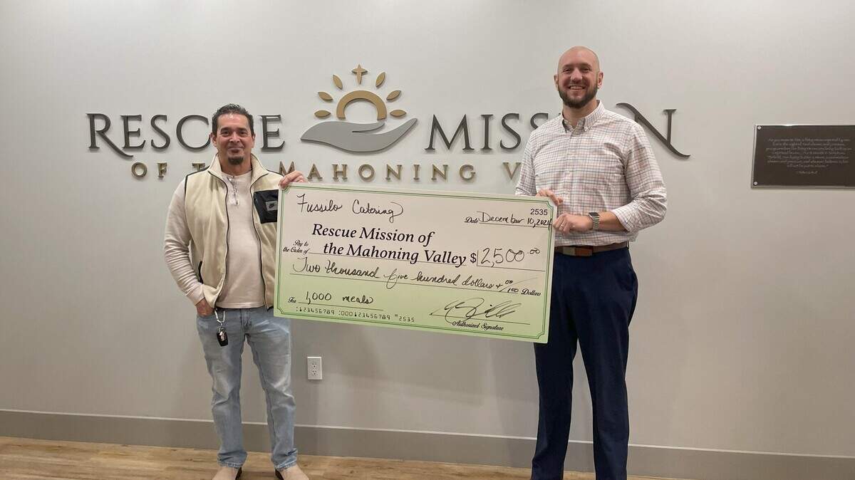 Mark Fusillo donated $2,500 to the Rescue Mission on Dec. 10, which will provide 1,000 meals to those in need during the Christmas season.