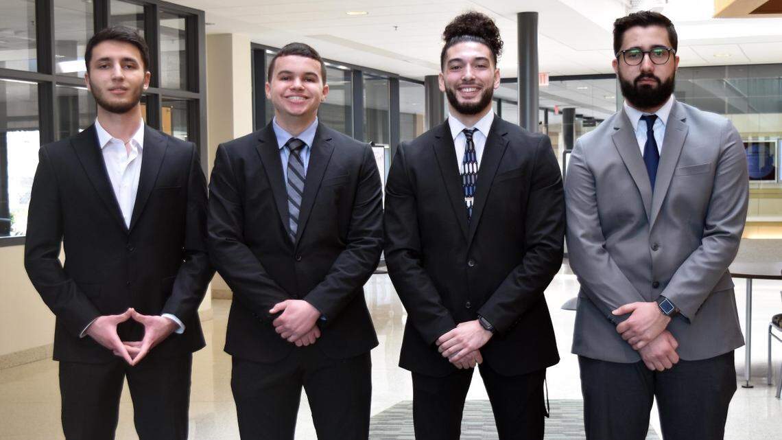 Jason Gibson, Finance major; Elman Kazimli, Financial Management/Accounting major; Christian Febinger, Finance major; and Jakob Peters, Economics major