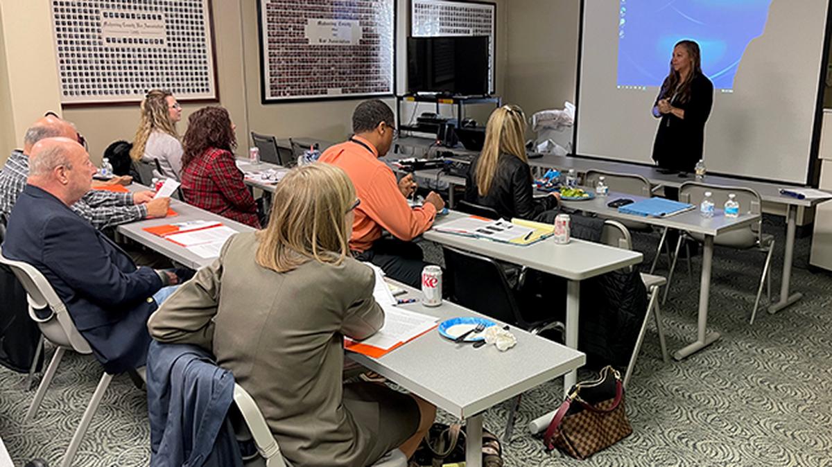 Vanessa Perkins, a human trafficking survivor, who now works as a bailiff for Franklin County Municipal Court, shared her story with local attorneys on Thursday, Nov. 4, 2021, at the Mahoning County Bar Association offices.
