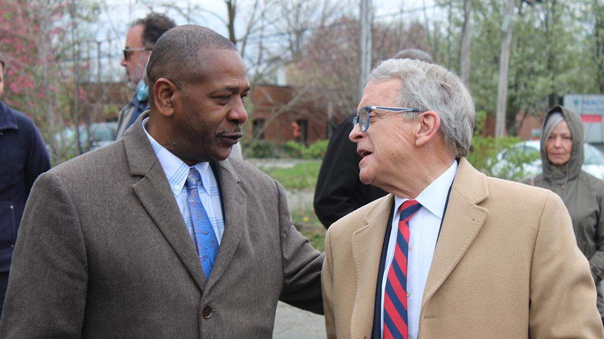 Warren Mayor Doug Franklin, left, meets with Gov. Mike DeWine prior to a formal announcement of a $3.4 million state grant to demolish the former St. Joseph Riverside Hospital on Wednesday, April 27, 2022, at the hospital.