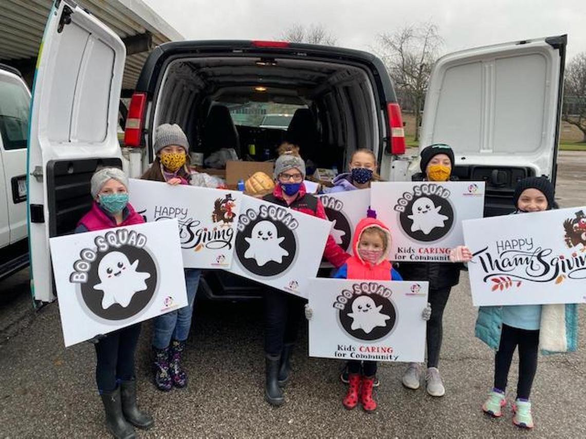 The Boo Squad distributed food to 210 families during a Thanksgiving drive in 2020. Back row, from left, are Alexis Flood, Giada DeSantis, Ava Flood, Gianna Page, Madison Medvec and Caroline Medvec. In front is Amelia Flood.