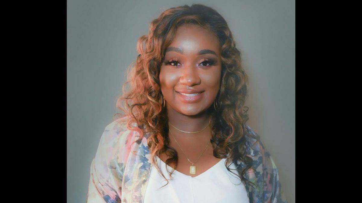 Ashlyn Symone, owner of Signatures By Symone.