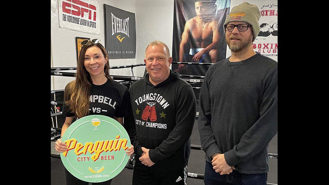 From left are Aspasia Lyras-Bernacki, co-owner of Penguin City Brewing Co.; Jack Loew, owner of Southside Boxing Club; and Richard Bernacki, co-owner of Penguin City.