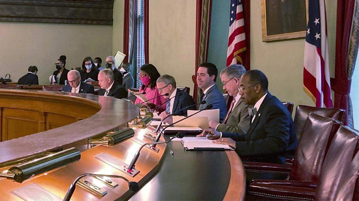 Members of the Ohio Redistricting Commission, from left, Senate President Matt Huffman, Auditor Keith Faber, House Minority Leader Emilia Sykes, Gov. Mike DeWine, Secretary of State Frank LaRose, House Speaker Bob Cupp and Sen. Vernon Sykes, conduct a meeting at the Ohio Statehouse in Columbus on Aug. 6, 2021. Huffman and Cupp stepped down from the commission in early May 2022.