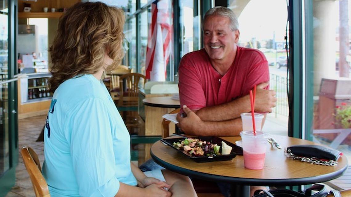 Joanne and Brian Reiser come to Peaberry's Cafe a couple times a week and went to the cafe Tuesday to support the business after it closed early due to two customers refusing to wear masks in the store. Customers are allowed to remove masks when sitting to eat at the cafe. (Ellen Wagner/Mahoning Matters)
