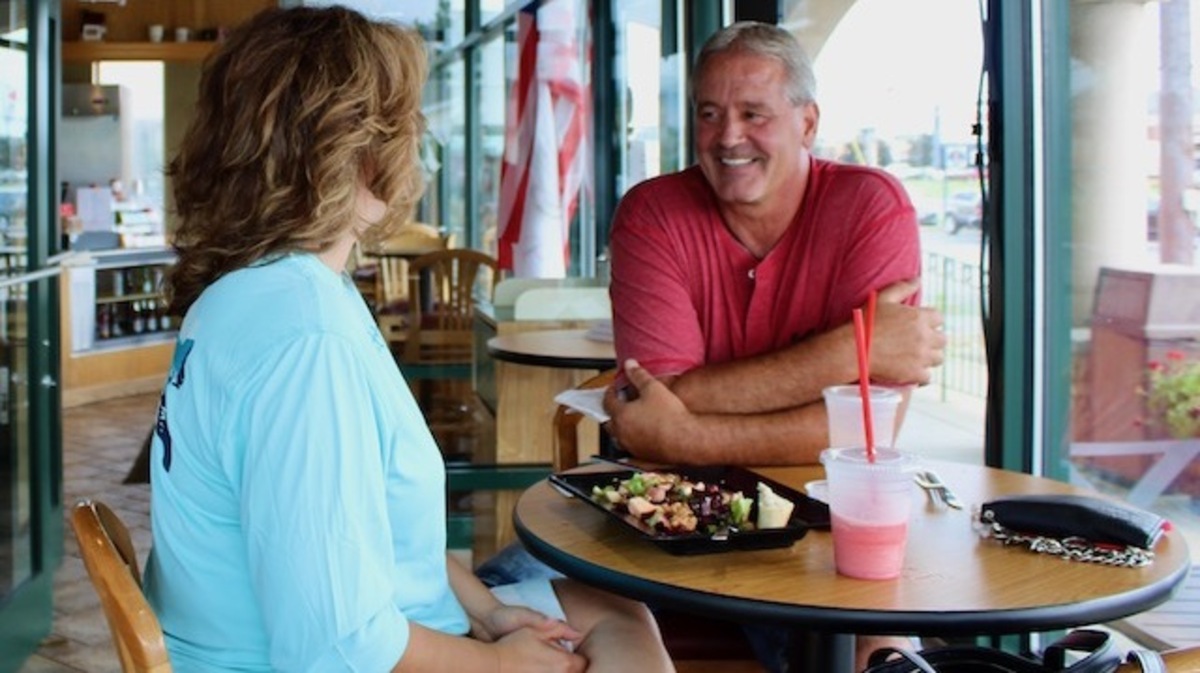 Joanne and Brian Reiser come to Peaberry's Cafe a couple times a week and went to the cafe Tuesday to support the business after it closed early due to two customers refusing to wear masks in the store. Customers are allowed to remove masks when sitting to eat at the cafe. (Ellen Wagner/Mahoning Matters)