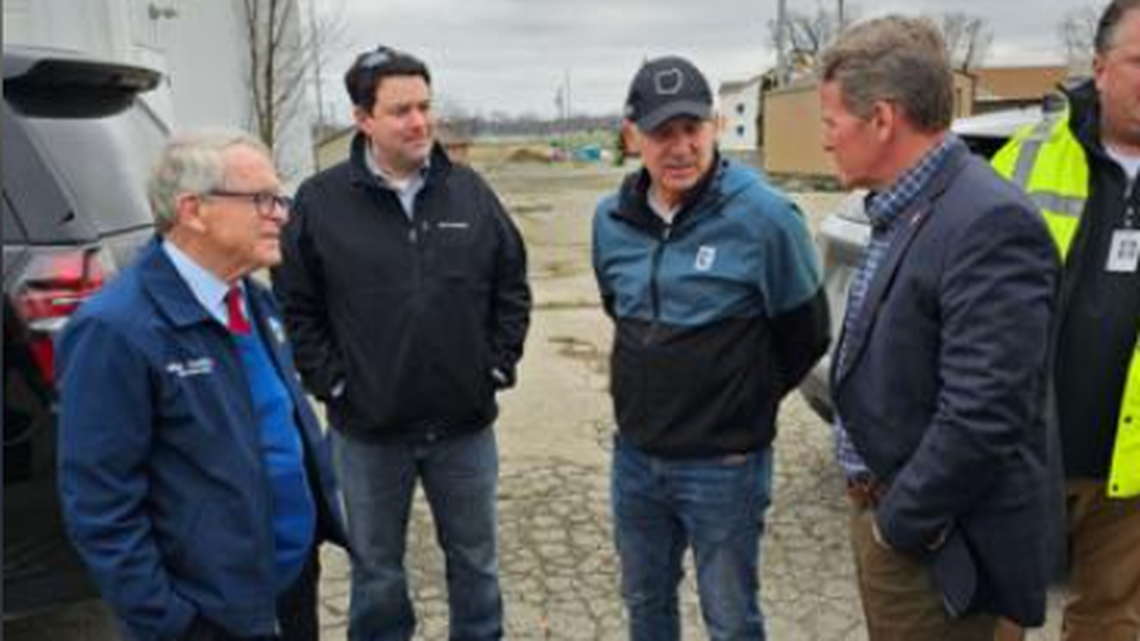 Ohio Senate President Matt Huffman (second from right) and Sen. Rob McColley (second from left) joined Gov. Mike DeWine (left) recently after a tornado ripped through the Indiana Lake community.