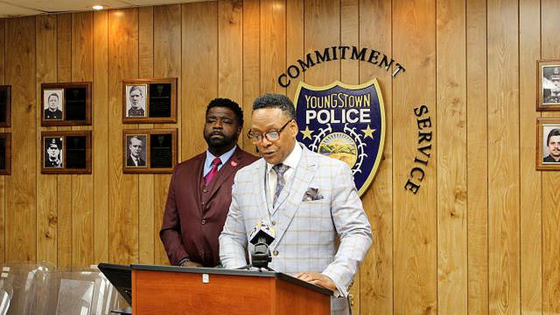 Youngstown Police Department Chief Carl Davis speaks during a news conference Thursday to discuss the recent violence in the city. Mayor Jamael Tito Brown stands behind him. (Robert K. Yosay | Mahoning Matters)