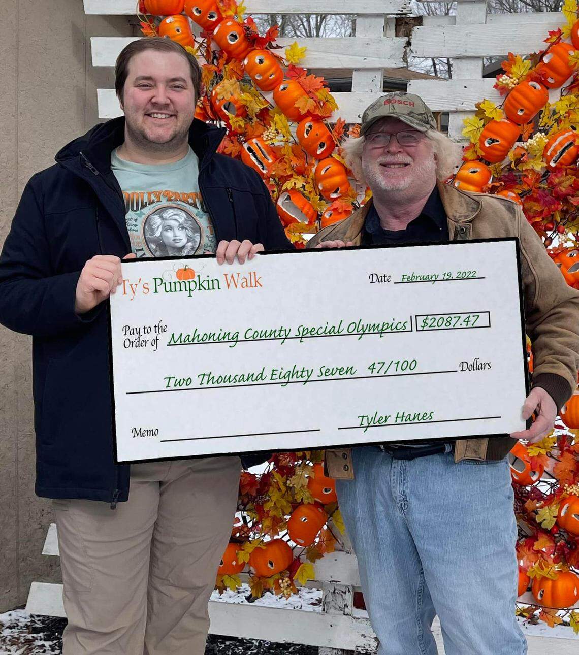 Ty Hanes and Paul Iden, a representative for Special Olympics of Mahoning County