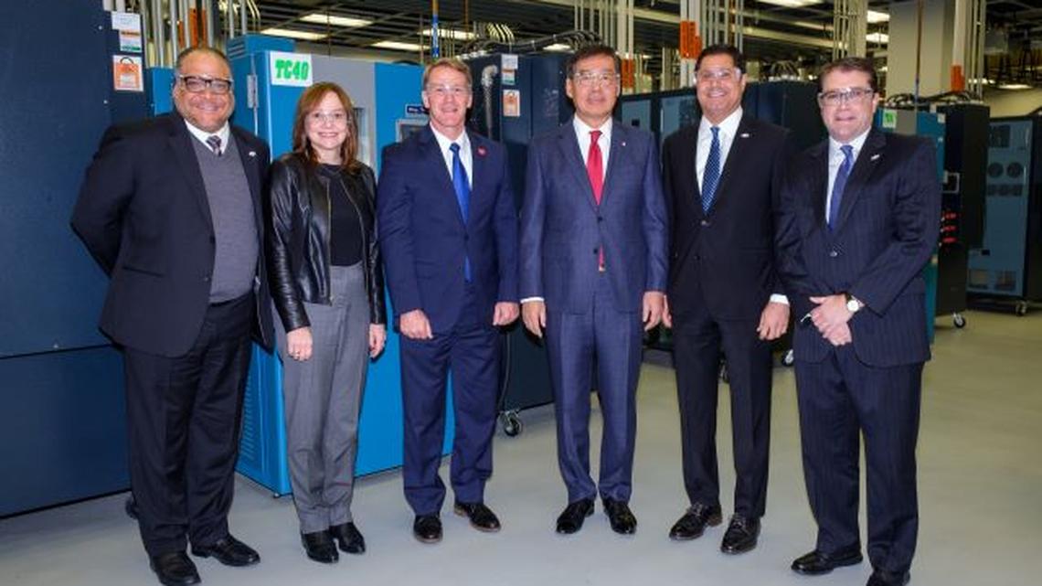 Ohio Lt. Governor Jon Husted, third from left, is flanked by General Motors Chairwoman and CEO Mary Barra, left and LG Chem Vice Chairman and CEO Hak Cheol Shin as GM and LG Chem announce a new joint venture that will mass produce electric vehicle batteries in Lordstown. The announcement was made today in Warren, Mich. The two companies will invest up to $2.3 billion to create a battery cell assembly plant in Lordstown. The joint venture will create more than 1,100 new jobs. Groundbreaking is expected in mid-2020. (Photo by Steve Fecht for GM and LG Chem)