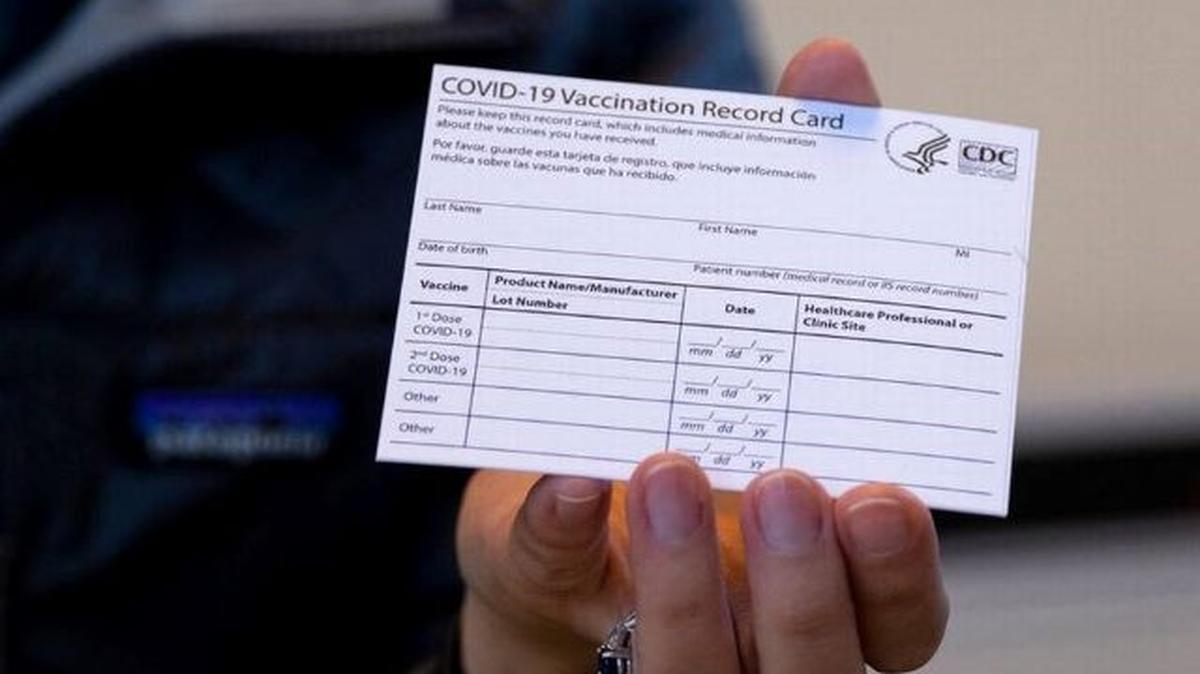 Experts have said it’s important to hold onto your COVID vaccination card. (AP Photo | Craig Ruttle)
