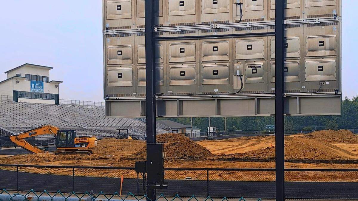Excavation of the former grass playing surface, pictured above, is underway at West Branch High School’s 5,200-seat Clinton Heacock Stadium. A new artificial surface playing field will be installed this summer, as well as new MUSCO LED lights and other improvements.