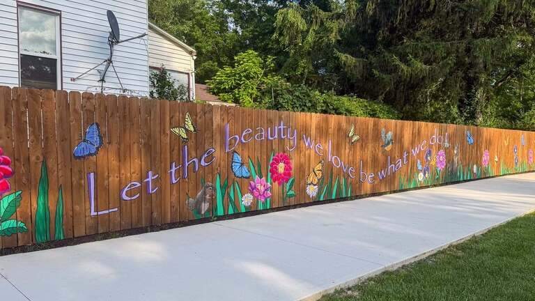 Youngstown State University art graduates create mural for Happy Place Sanctuary