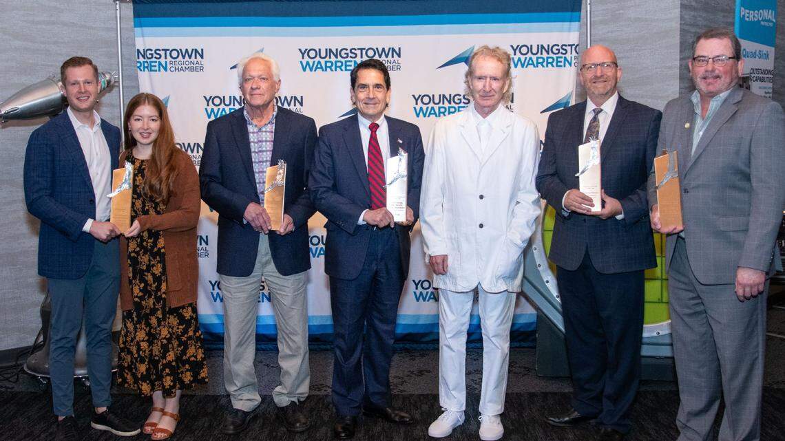 (left to right) Evan Schumann, Marisa Sergi-Schumann, Keith Dunbar, Chuck George, John Zabrucky, Anthony Trevena and Marty Loney at Salute to Business breakfast