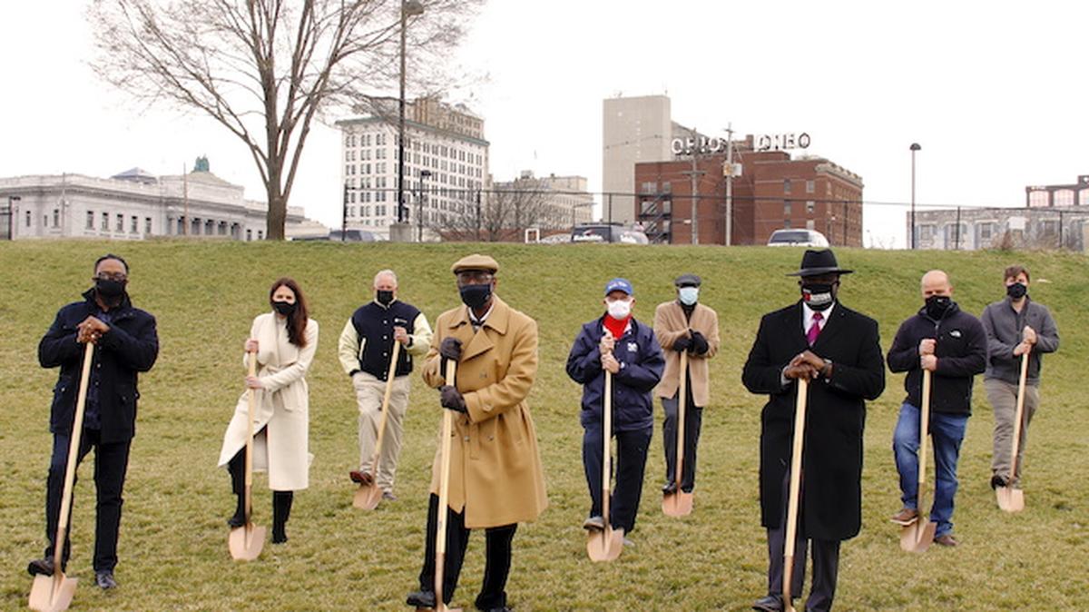 Pictured at the site of the Robinson-Shuba Commemorative Statue are (from left) Julius Oliver, Youngstown 1st Ward Councilman; Kate Spires, architect with BSHM Architects; Mike Shuba, son of George Shuba; statue project co-chairs Ernie Brown, Greg Gulas and Herb Washington; Youngstown Mayor Jamael Tito Brown; Brian Brock, president of Brock & Associates Builders Inc.; and Nick Chretien, program manager for the Economic Action Group.