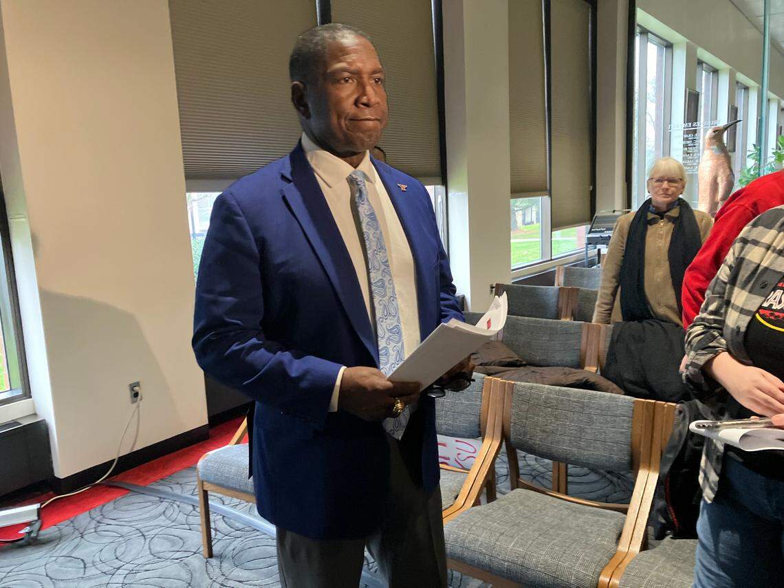 Youngstown State Board of Trustees president Michael A. Peterson gets ready to talk to media members following Thursday’s meeting.