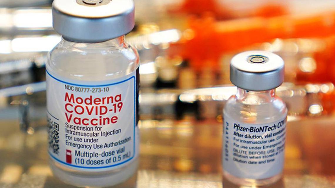 Vials for the Moderna and Pfizer COVID-19 vaccines. (AP Photo)