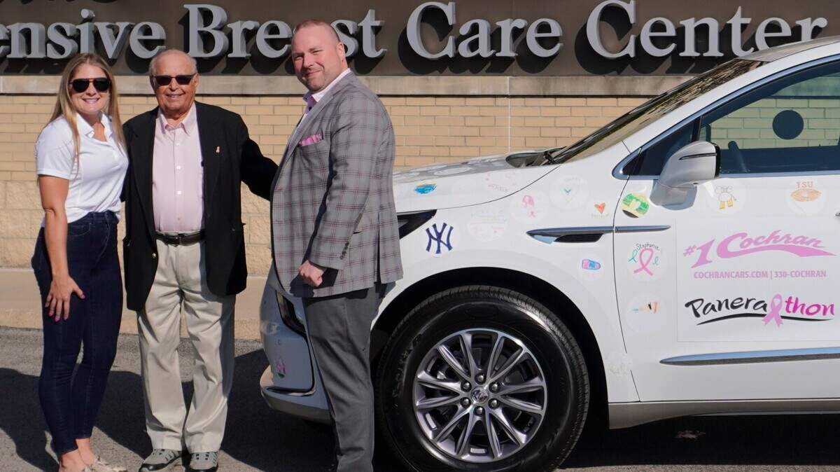From left to right, Candace Madden, Mercy Health Foundation; Dr. Rashid Abdu, Joanie Abdu center; Derek Snyder, #1 Cochran.